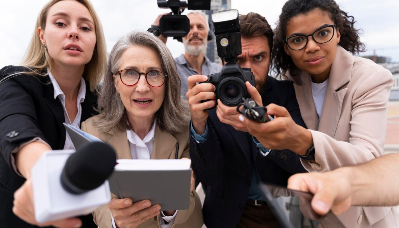 group-people-taking-interview-outdoors-min